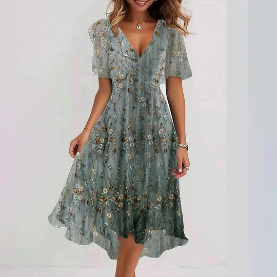 Elena | Luftiges Wickelkleid mit floraler Note