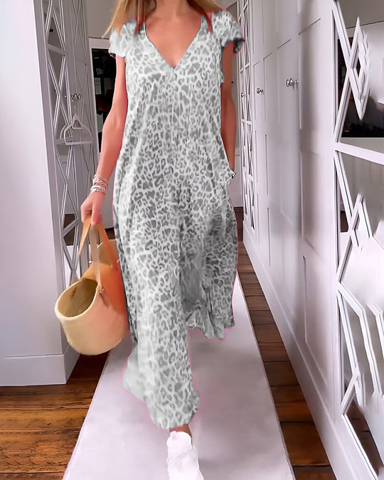 Carolin | Fließendes Kleid mit Leopardenmuster und besonderem Stil