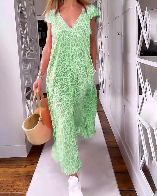Carolin | Fließendes Kleid mit Leopardenmuster und besonderem Stil